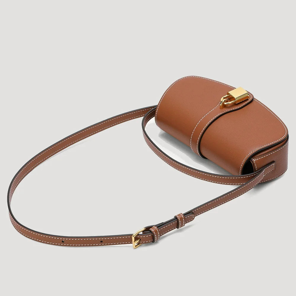 Tan Leather Mini Saddle Bag with Gold Padlock Clasp and Contrast Stitching